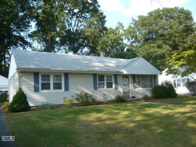 3446 Old Town Road Bridgeport, CT 06606 - Photo 1 of 1 a front view of a house with garden