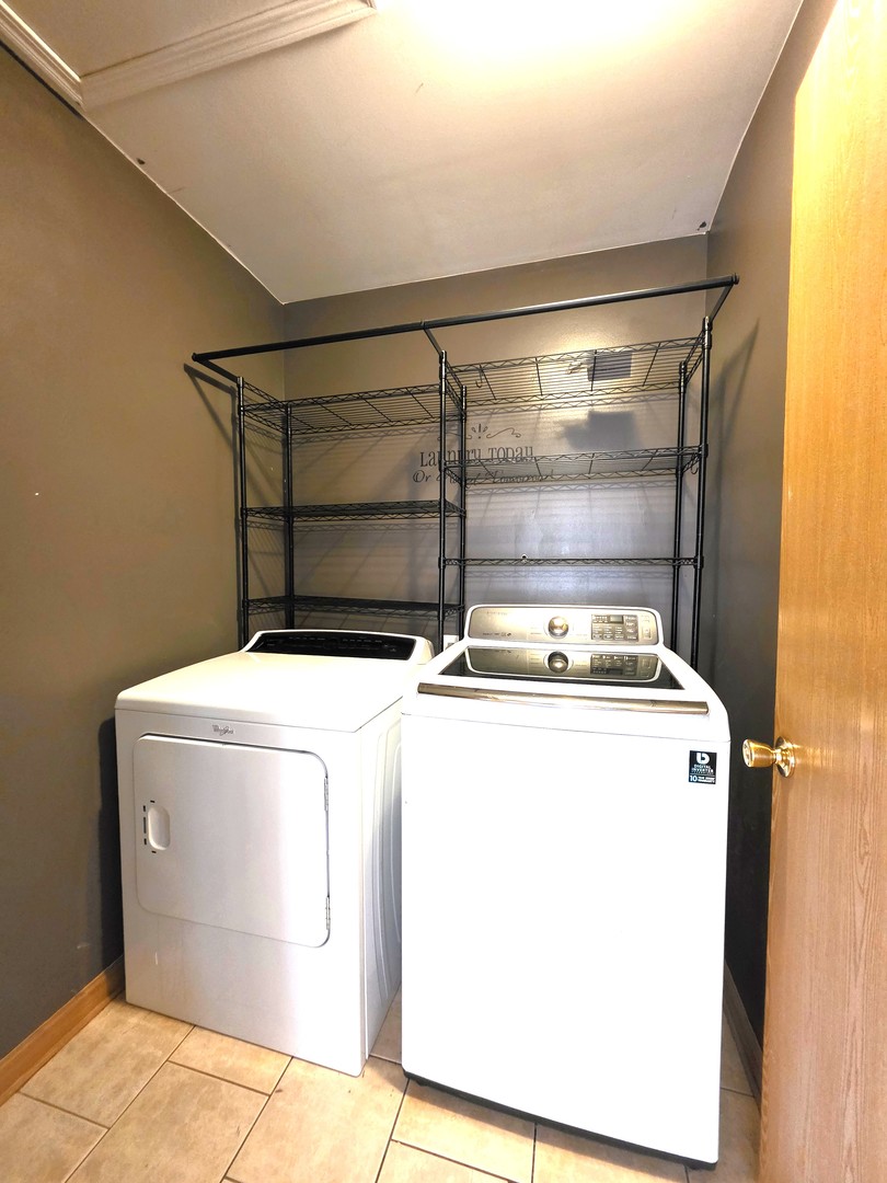 2513 Ridgefield Drive Belvidere, IL 61008 - Photo 12 of 35 a utility room with dryer and washer
