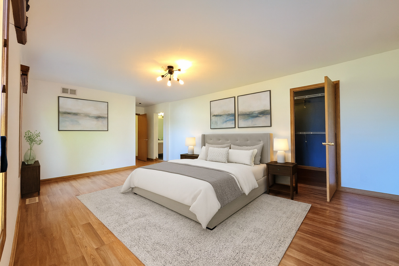 2513 Ridgefield Drive Belvidere, IL 61008 - Photo 14 of 35 a bedroom with a bed and wooden floor