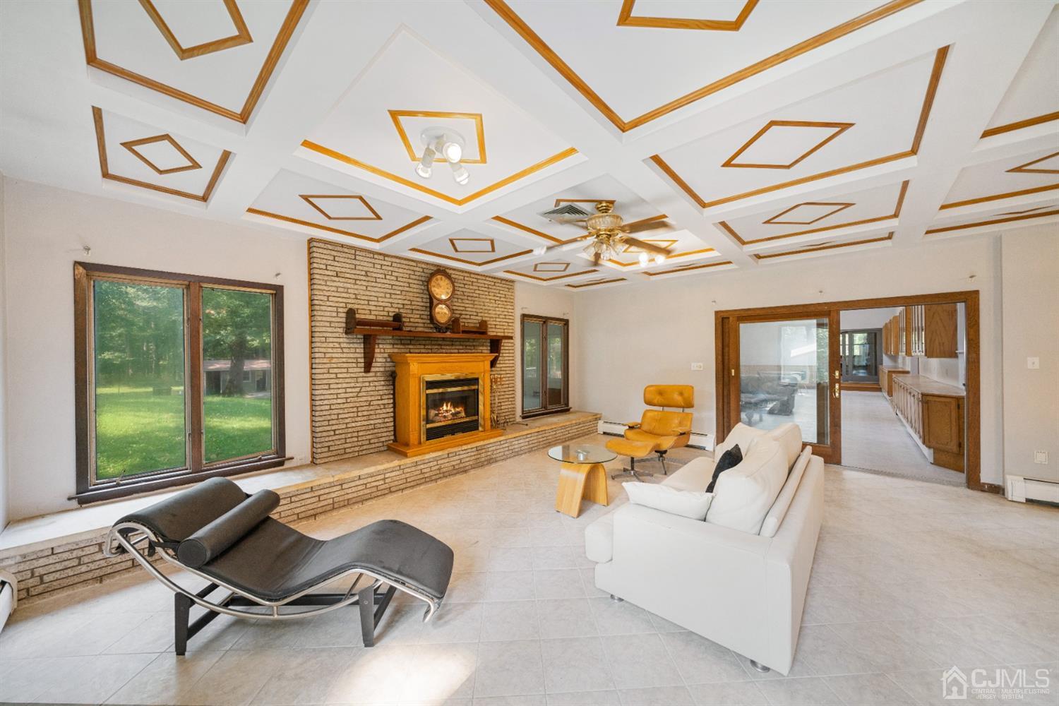 109 Fresh Ponds Road Monroe Township, NJ 08831 - Photo 15 of 83 a living room with furniture or outdoor space with a large window