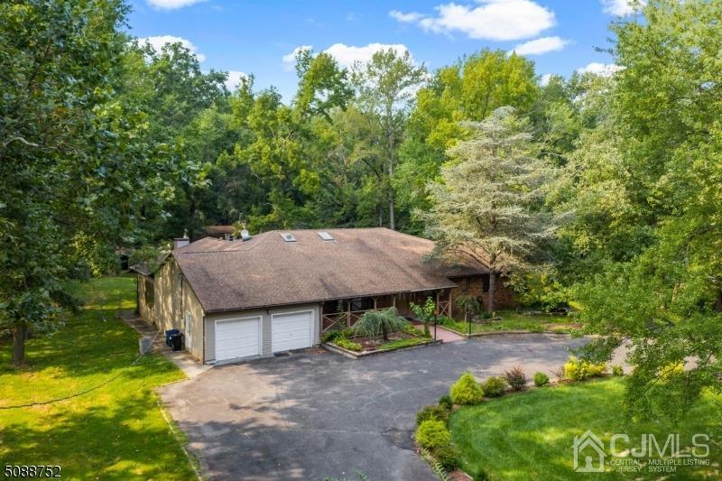 109 Fresh Ponds Road Monroe Township, NJ 08831 - Photo 38 of 83 an aerial view of a house with yard and outdoor seating