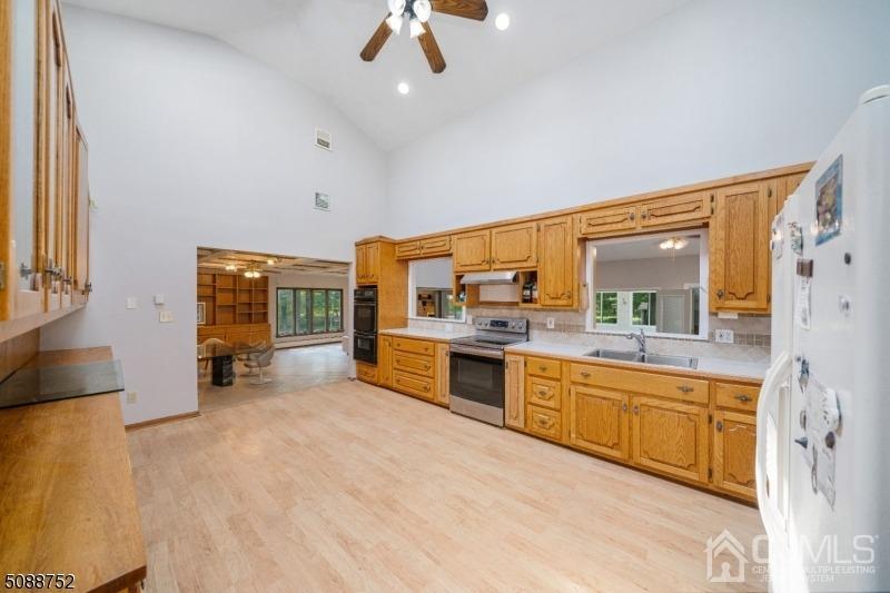 109 Fresh Ponds Road Monroe Township, NJ 08831 - Photo 54 of 83 a large white kitchen with a large window