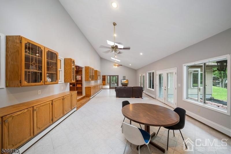109 Fresh Ponds Road Monroe Township, NJ 08831 - Photo 68 of 83 a living room with stainless steel appliances kitchen island granite countertop furniture and a kitchen view