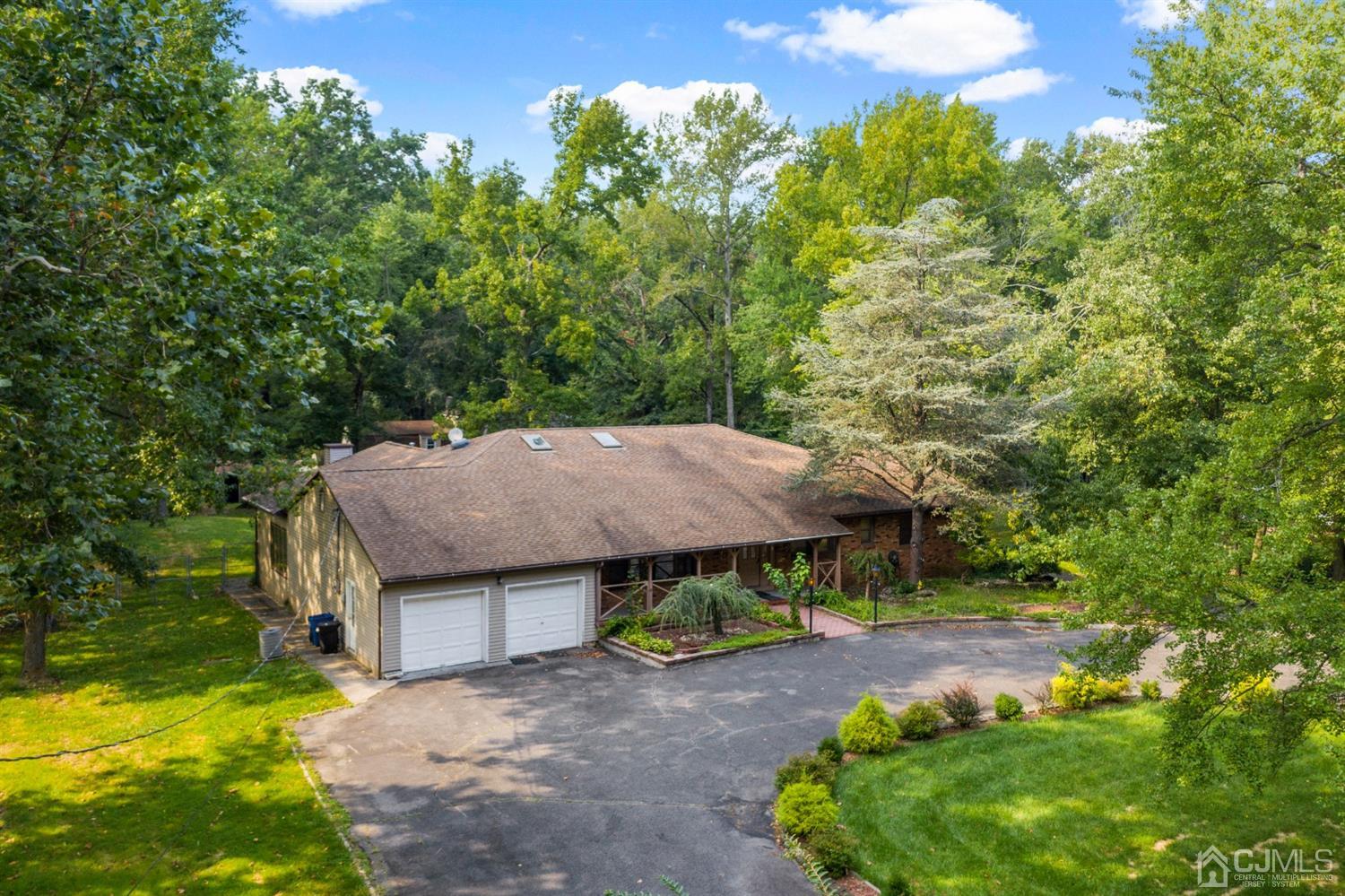 109 Fresh Ponds Road Monroe Township, NJ 08831 - Photo 83 of 83 an aerial view of a house with yard and outdoor seating