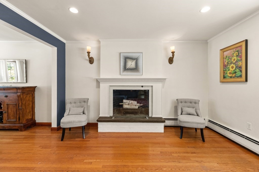 8 Candlewood Road Lynnfield, MA 01940 - Photo 12 of 41 a living room with furniture and a fireplace