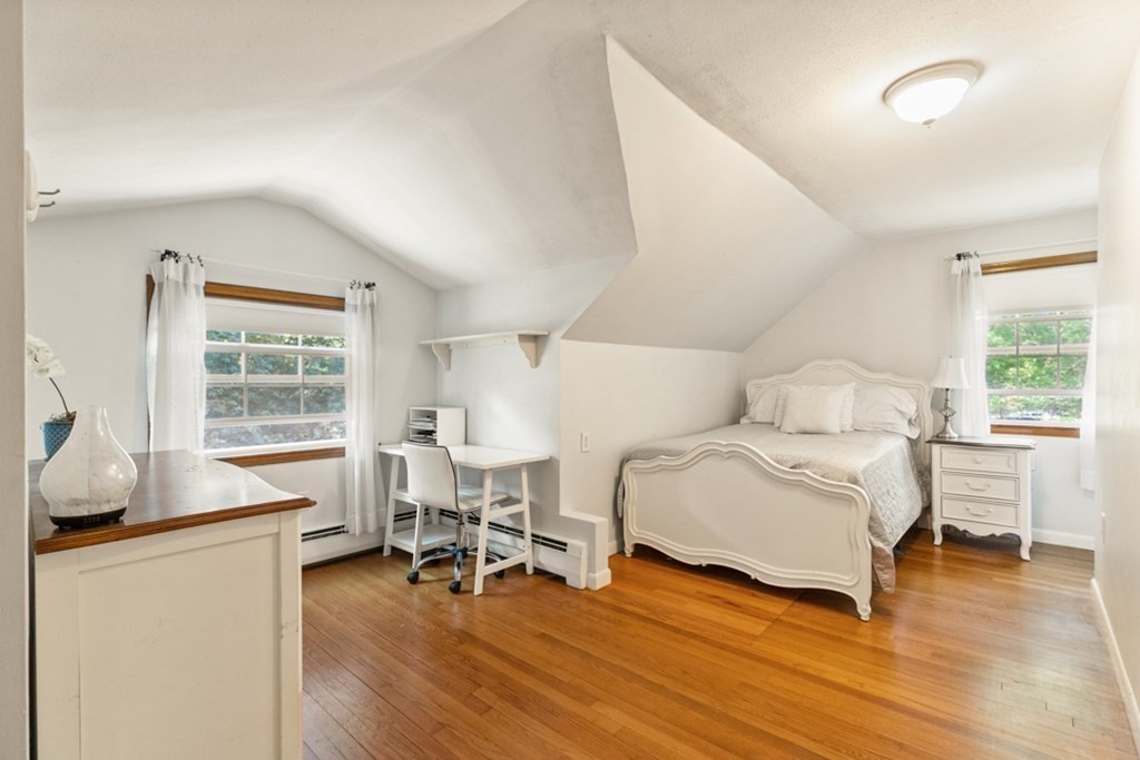 8 Candlewood Road Lynnfield, MA 01940 - Photo 23 of 41 a bedroom with a bed and wooden floor