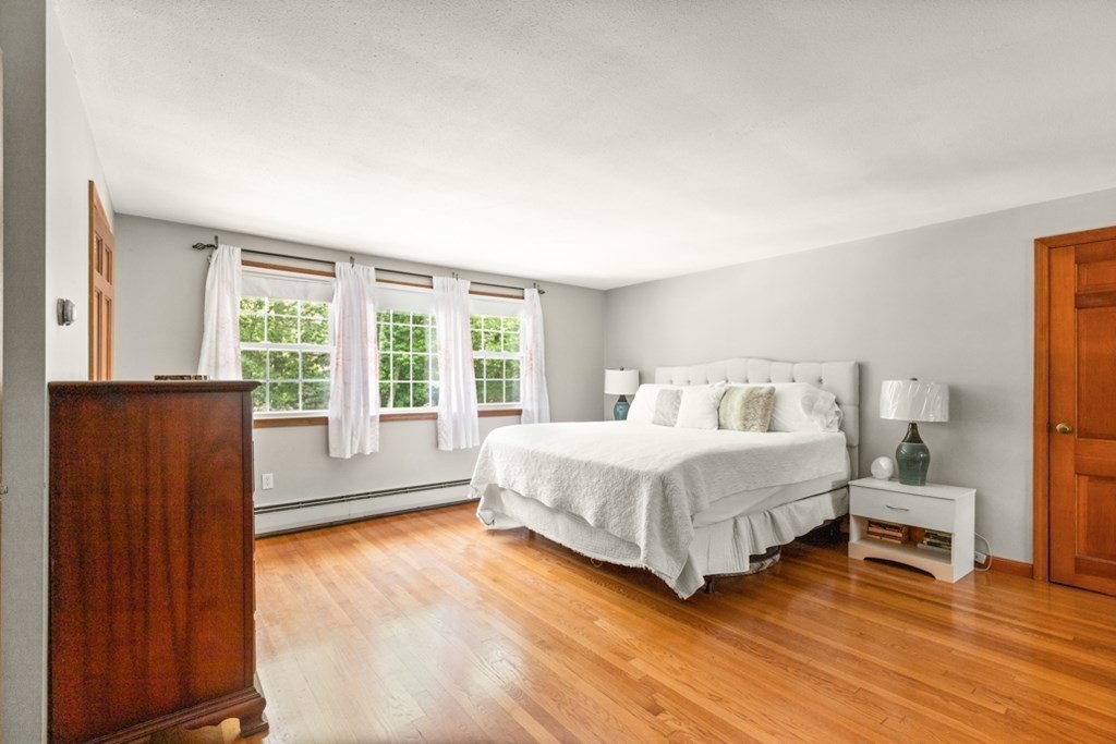 8 Candlewood Road Lynnfield, MA 01940 - Photo 24 of 41 a bed room with a bed and a window