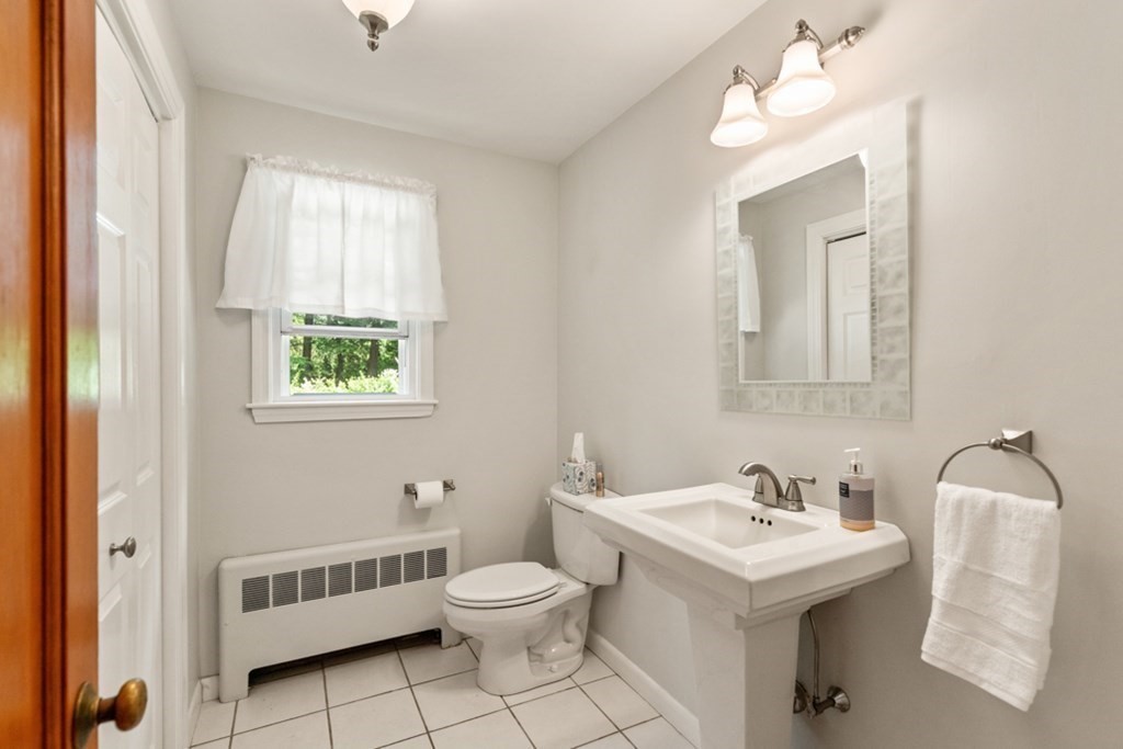 8 Candlewood Road Lynnfield, MA 01940 - Photo 26 of 41 a bathroom with a sink and a mirror