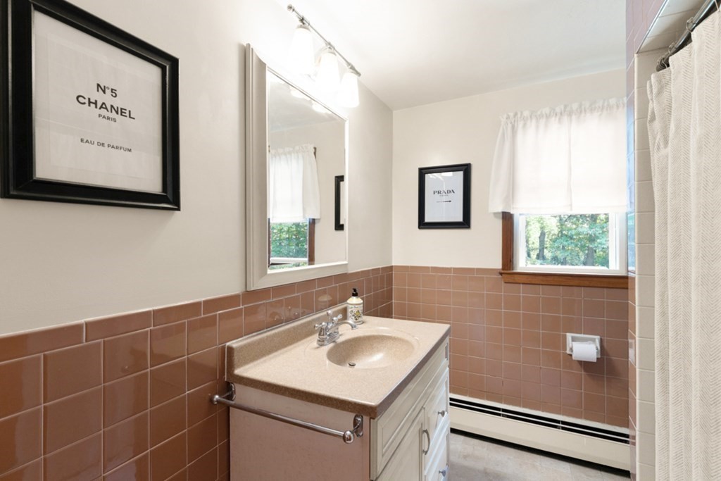 8 Candlewood Road Lynnfield, MA 01940 - Photo 27 of 41 a bathroom with a sink toilet and vanity