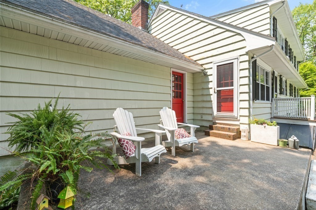 8 Candlewood Road Lynnfield, MA 01940 - Photo 30 of 41 a view of a chairs and table in a patio
