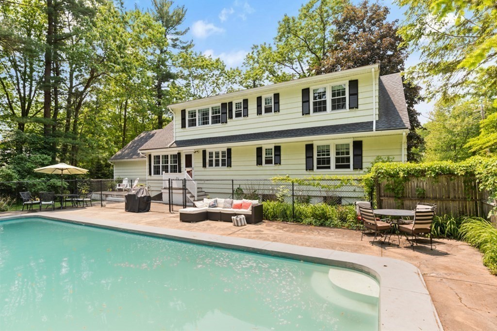 8 Candlewood Road Lynnfield, MA 01940 - Photo 34 of 41 a front view of a house with swimming pool and porch