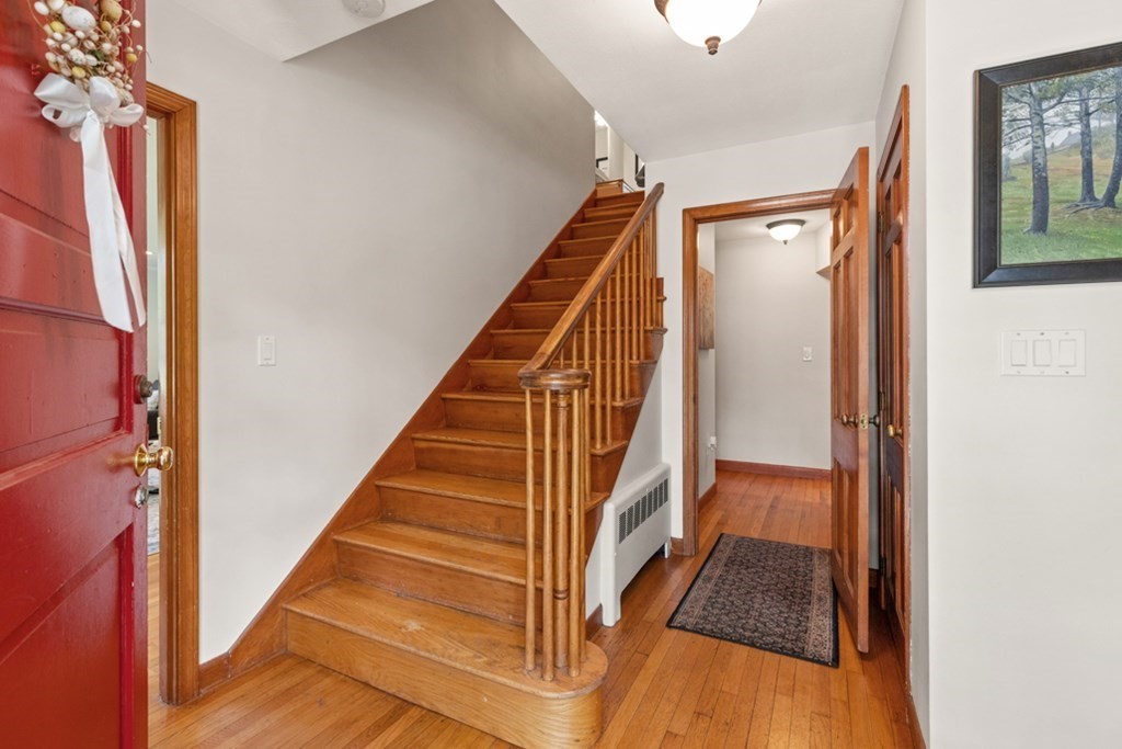 8 Candlewood Road Lynnfield, MA 01940 - Photo 6 of 41 a view of a hallway with staircase