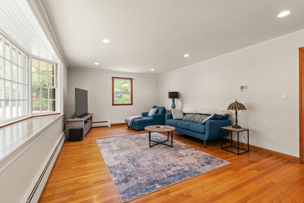 8 Candlewood Road Lynnfield, MA 01940 - Photo 8 of 41 a living room with furniture and a rug