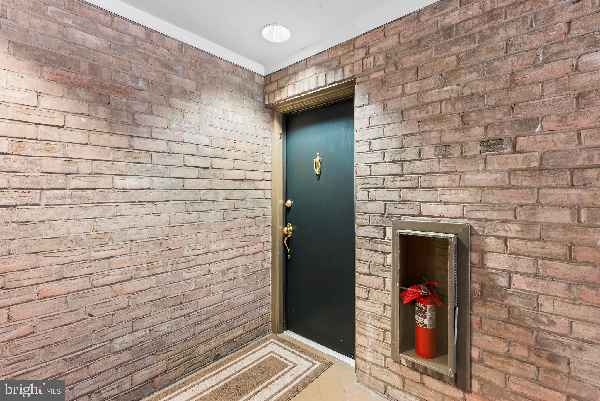 110 Cross Keys Road, Unit F Baltimore, MD 21210 - Photo 2 of 47 a front view of a house with a door