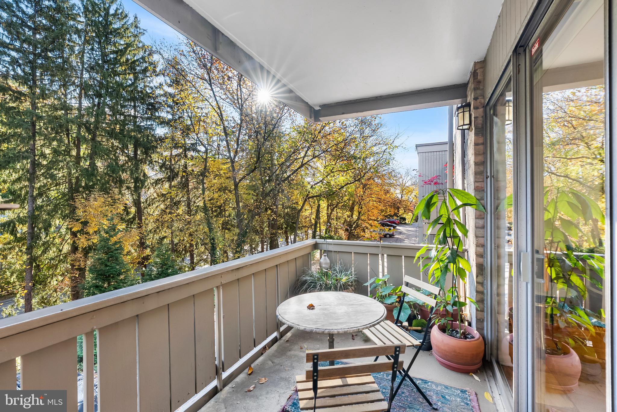 110 Cross Keys Road, Unit F Baltimore, MD 21210 - Photo 24 of 47 a view of a chair and table in the balcony