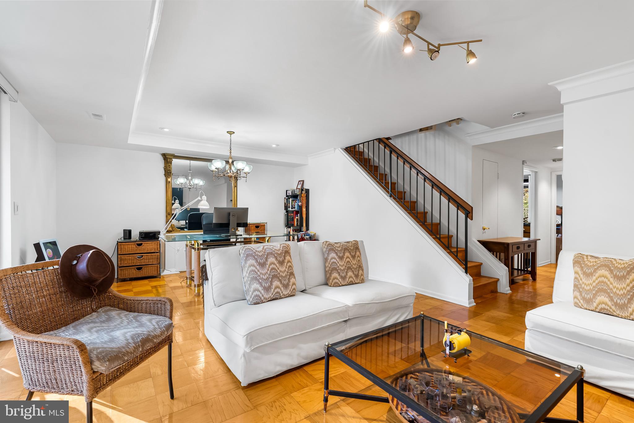 110 Cross Keys Road, Unit F Baltimore, MD 21210 - Photo 4 of 47 a living room with furniture and a dining table