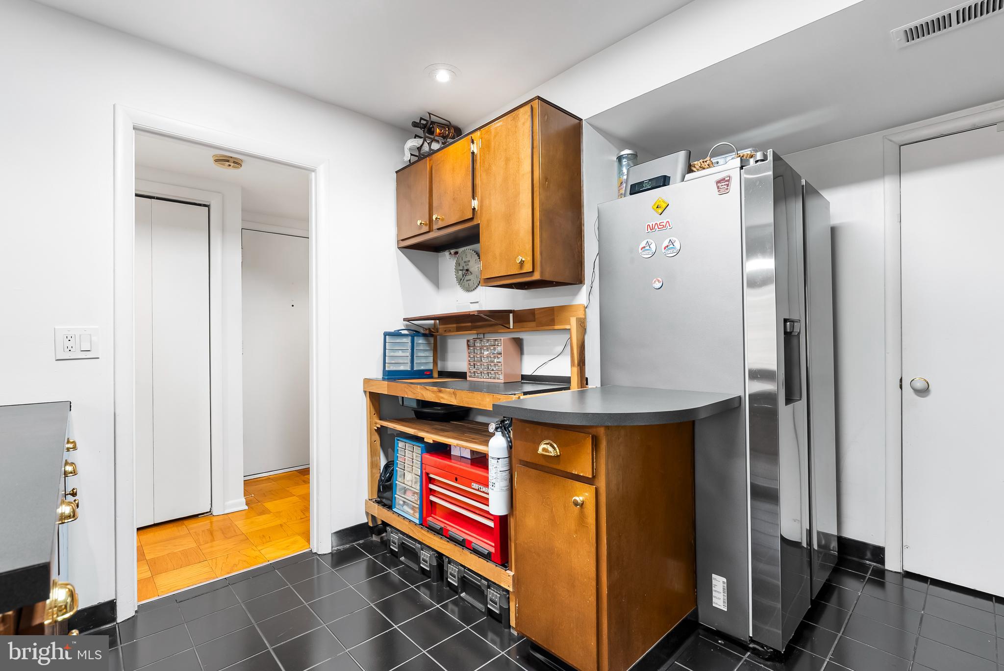 110 Cross Keys Road, Unit F Baltimore, MD 21210 - Photo 9 of 47 a room with storage and utility