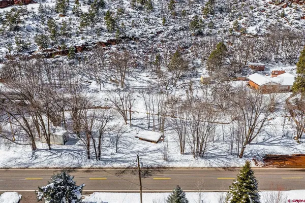 a view of a yard covered with snow in snow