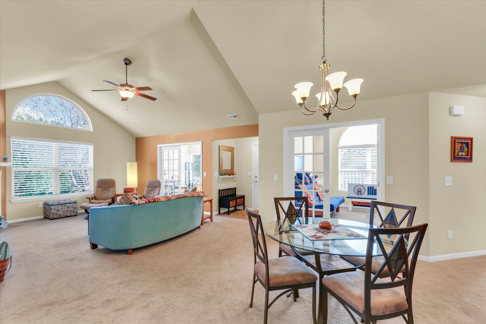 2730 Madelynn Drive Champaign, IL 61822 - Photo 22 of 35 a view of a dining room with furniture a livingroom and chandelier