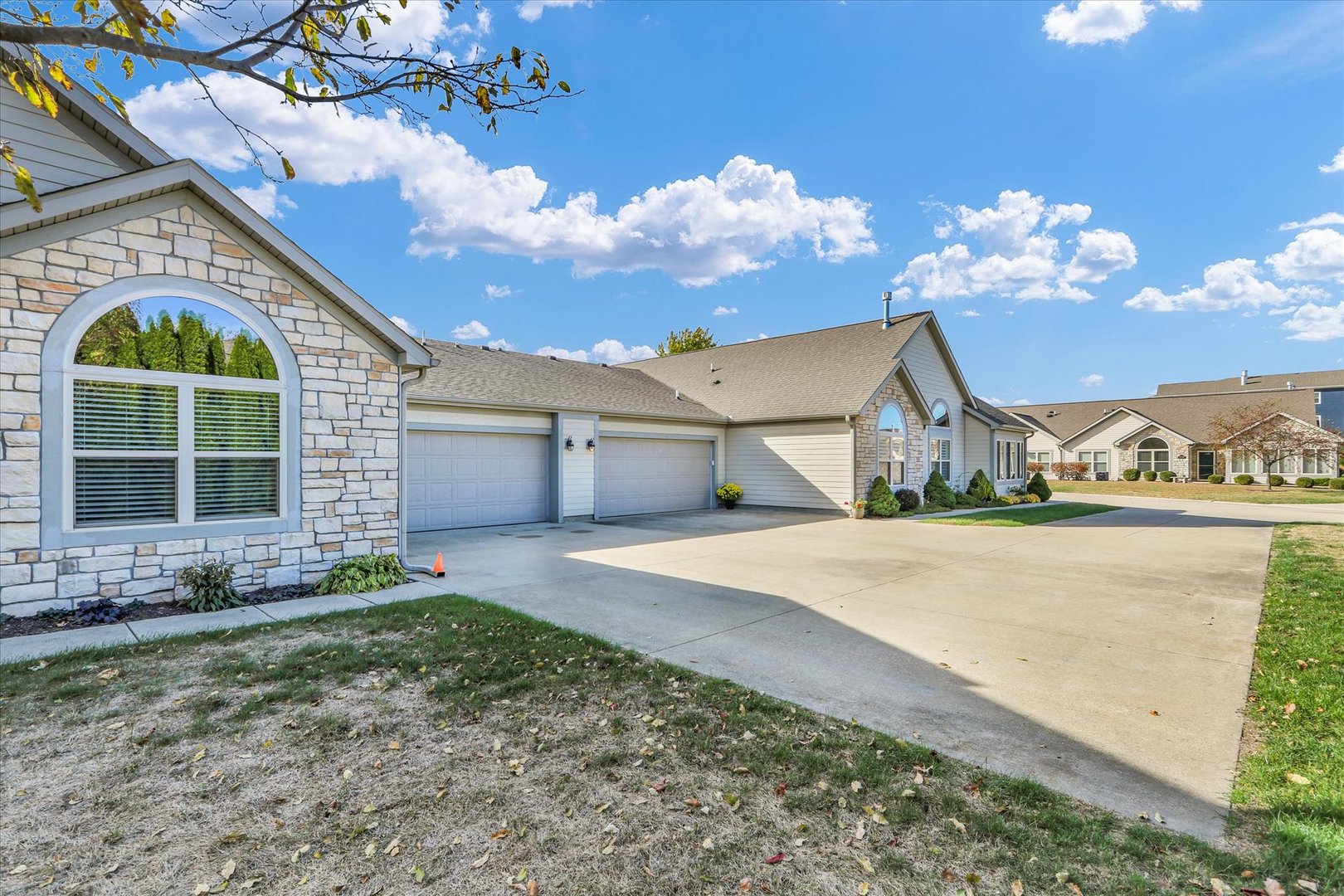 2730 Madelynn Drive Champaign, IL 61822 - Photo 3 of 35 a front view of a house with garden