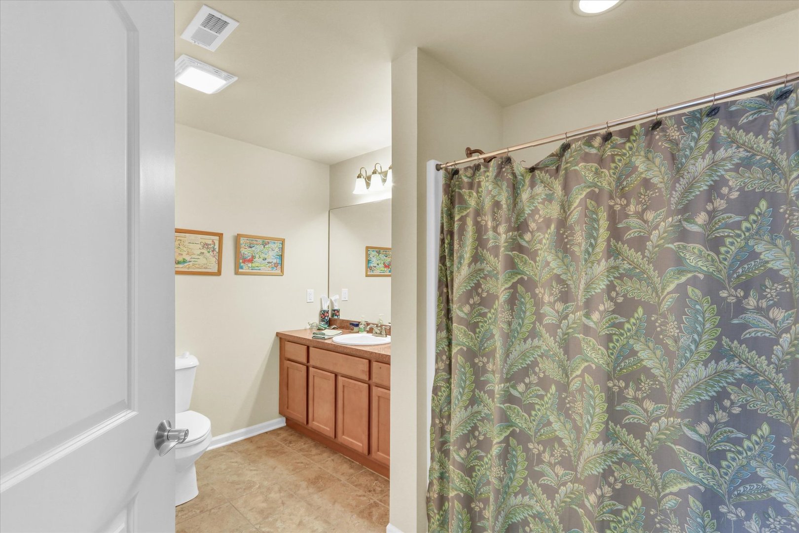 2730 Madelynn Drive Champaign, IL 61822 - Photo 32 of 35 a bathroom with a sink and a mirror