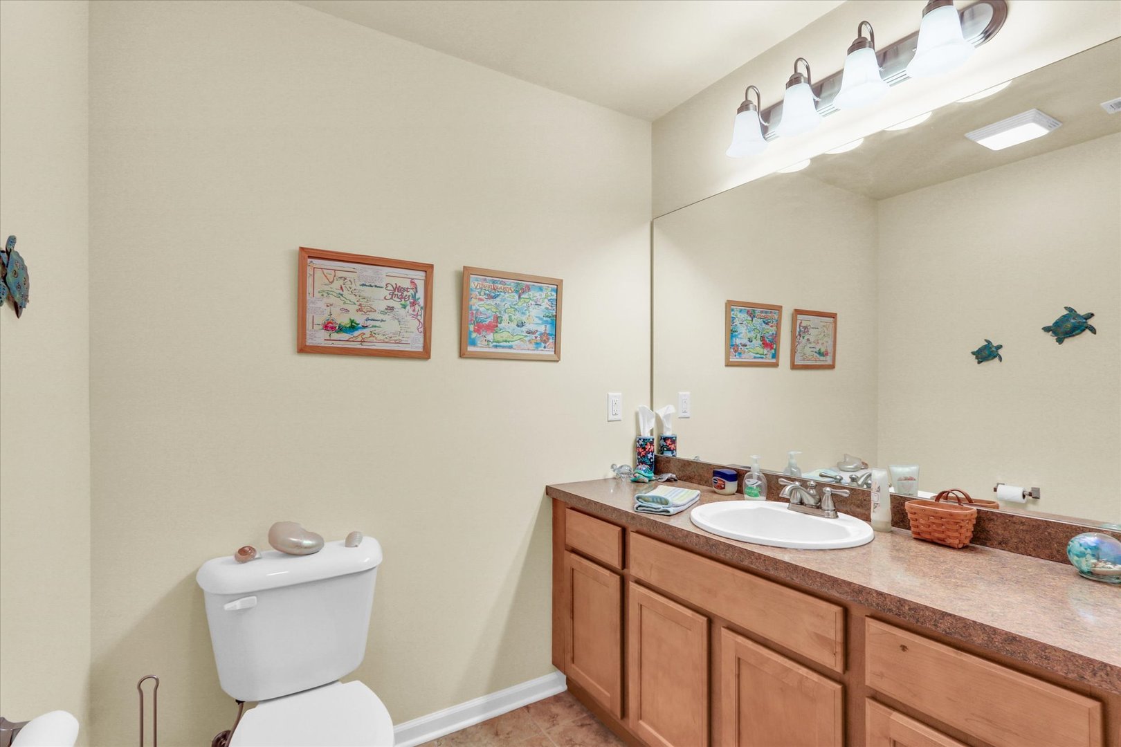 2730 Madelynn Drive Champaign, IL 61822 - Photo 33 of 35 a bathroom with a granite countertop sink mirror and toilet