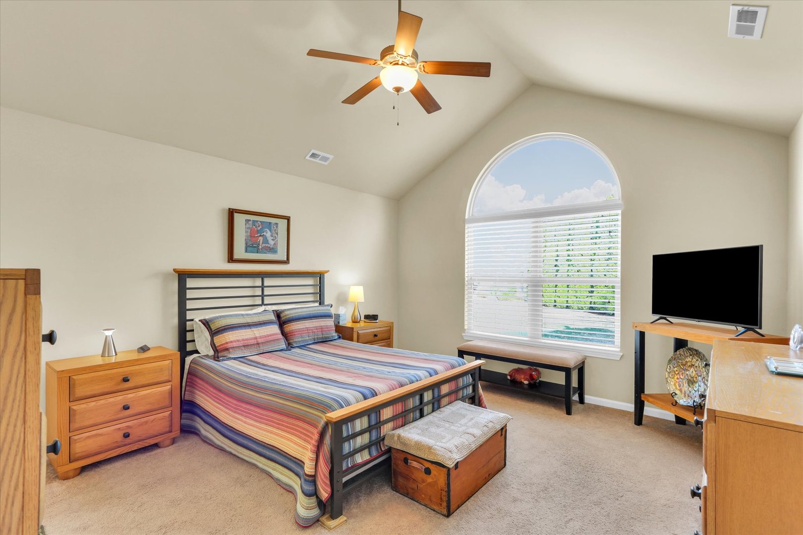 2730 Madelynn Drive Champaign, IL 61822 - Photo 8 of 35 a bedroom with furniture and a flat screen tv