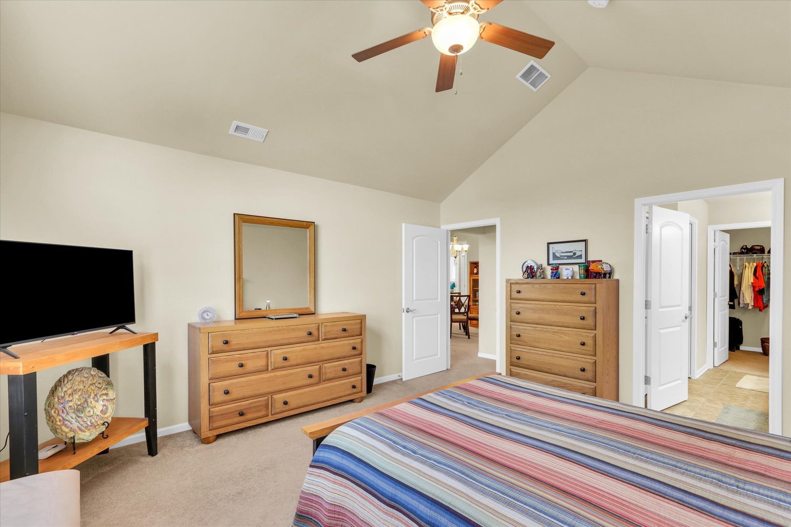 2730 Madelynn Drive Champaign, IL 61822 - Photo 9 of 35 a bedroom with furniture and a flat screen tv