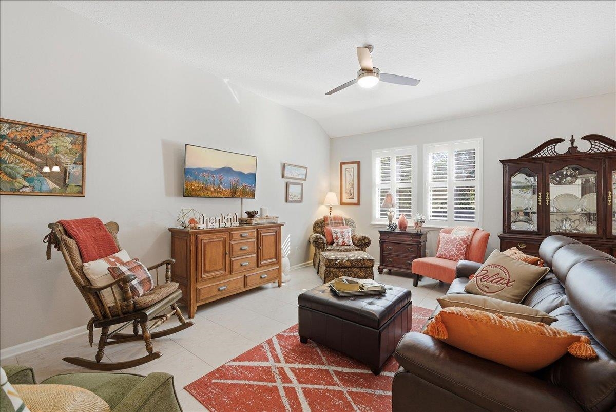 144 Litke Lane St. Augustine, FL 32086 - Photo 7 of 45 a living room with furniture and a flat screen tv