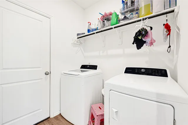 a utility room with dryer and washer