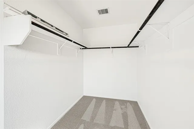 a view of small space with racks on the wall