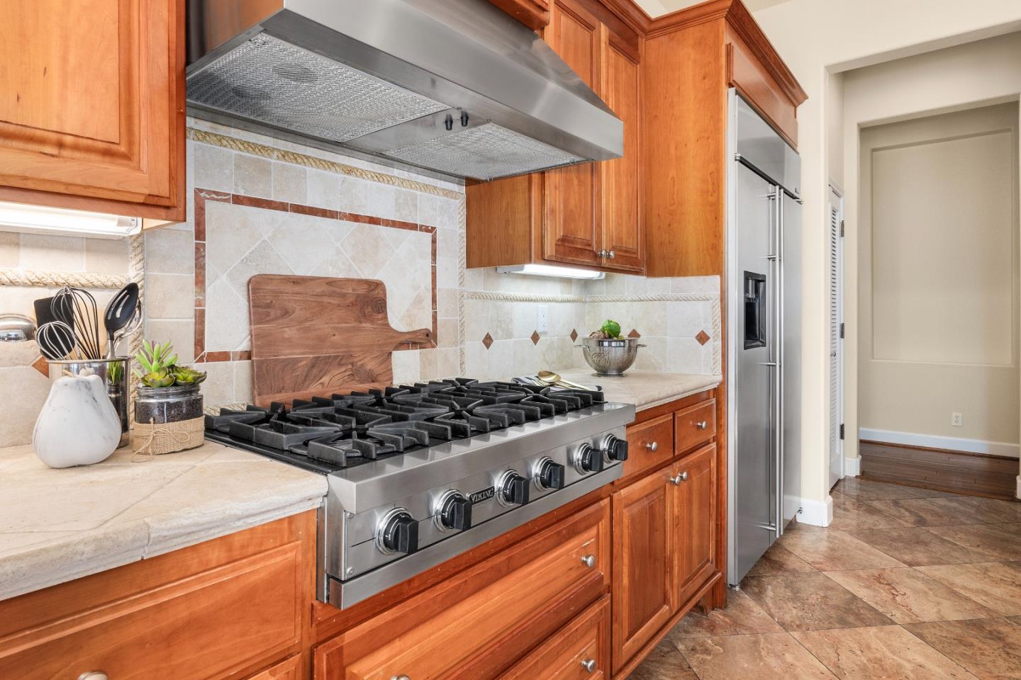 3918 Mainsail Place Soquel, CA 95073 - Photo 11 of 36 a kitchen with stainless steel appliances granite countertop a stove and a refrigerator