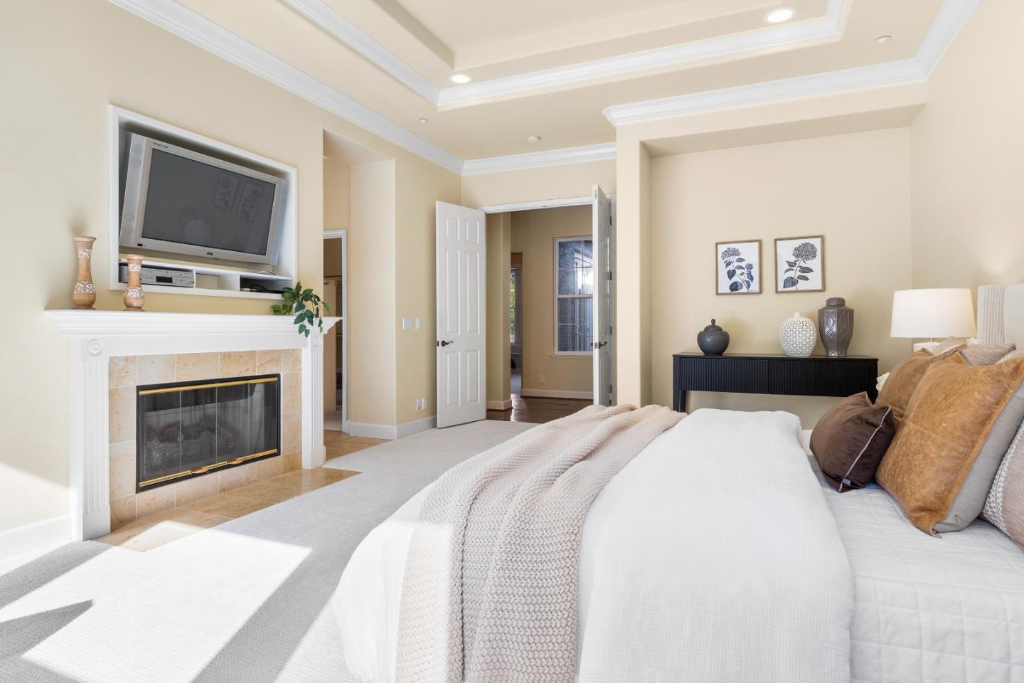 3918 Mainsail Place Soquel, CA 95073 - Photo 15 of 36 a bedroom with a bed and a fireplace