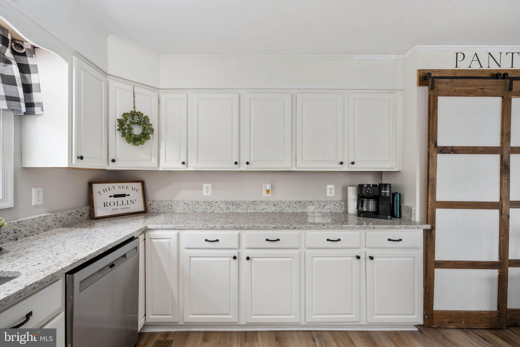 371 Greenbank Road Fredericksburg, VA 22406 - Photo 17 of 54 a kitchen with stainless steel appliances granite countertop a refrigerator sink and cabinets