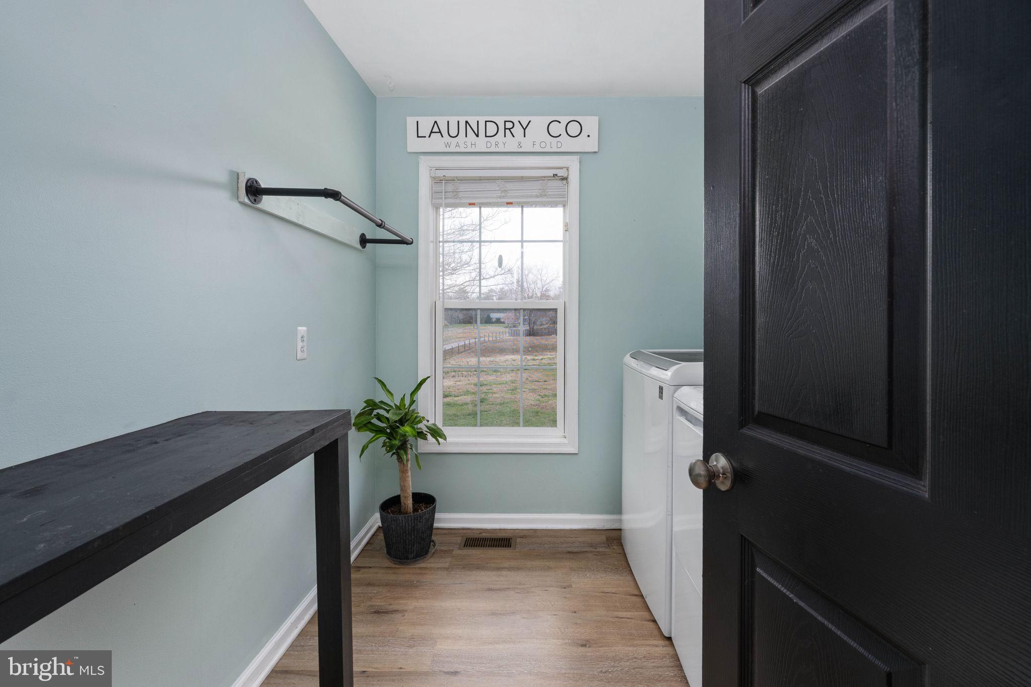 371 Greenbank Road Fredericksburg, VA 22406 - Photo 25 of 54 a view of hallway with window and wooden floor