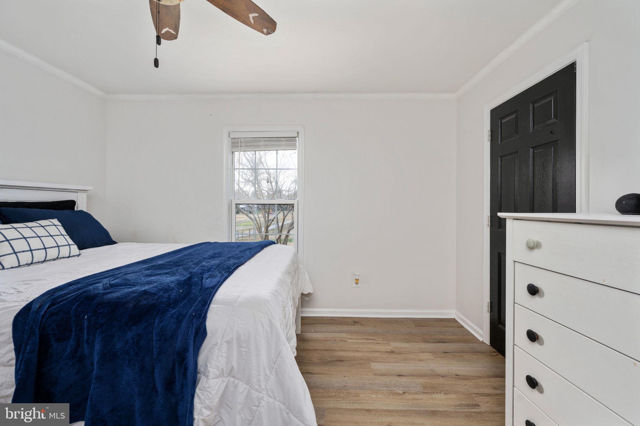 371 Greenbank Road Fredericksburg, VA 22406 - Photo 27 of 54 a bedroom with a bed and a dresser