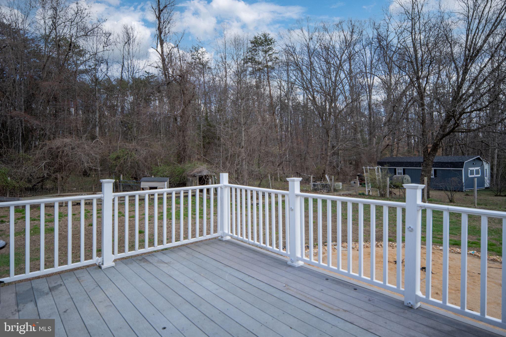 371 Greenbank Road Fredericksburg, VA 22406 - Photo 33 of 54 a view of a wooden roof deck
