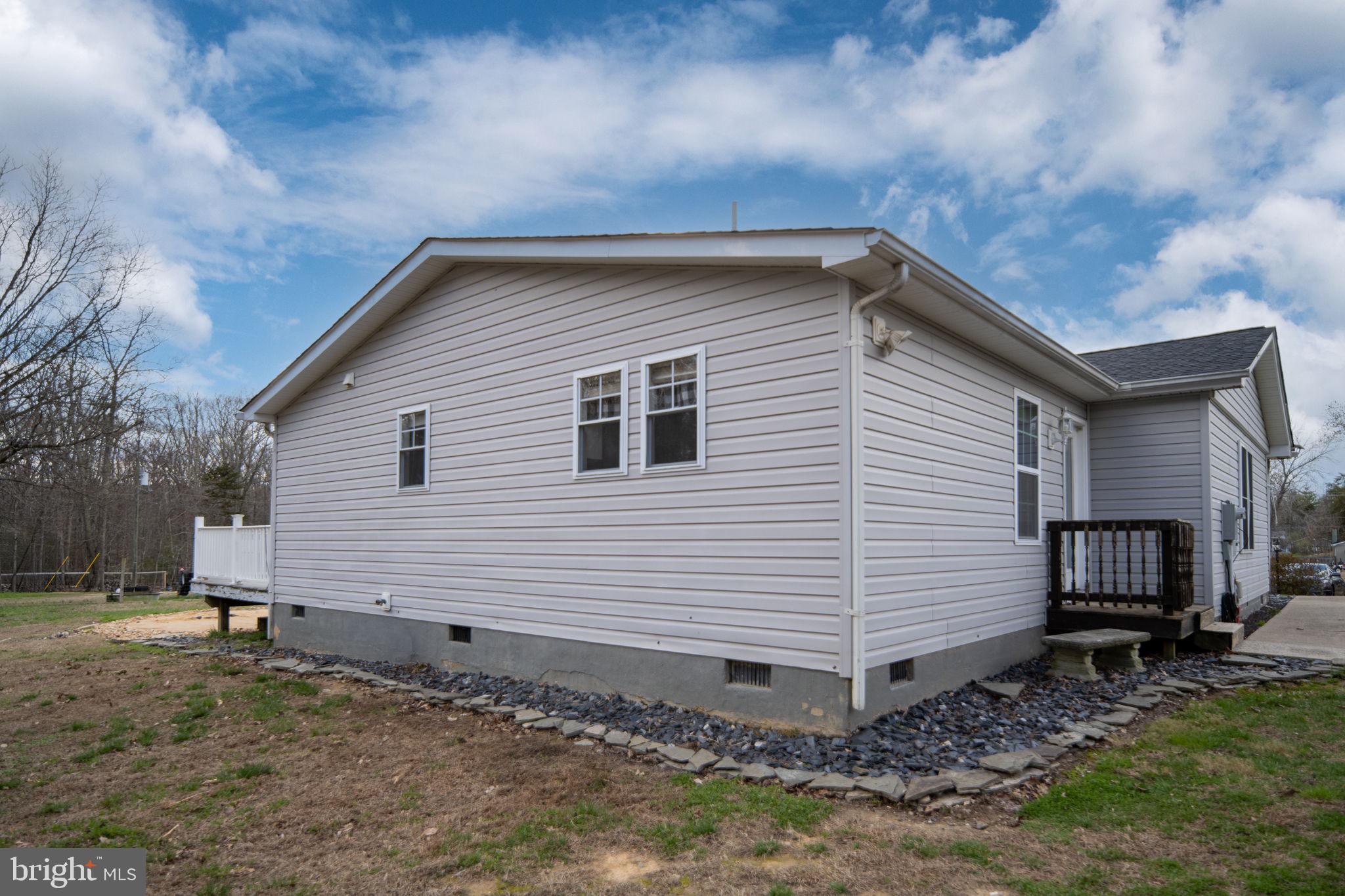 371 Greenbank Road Fredericksburg, VA 22406 - Photo 39 of 54 a view of a house with a yard