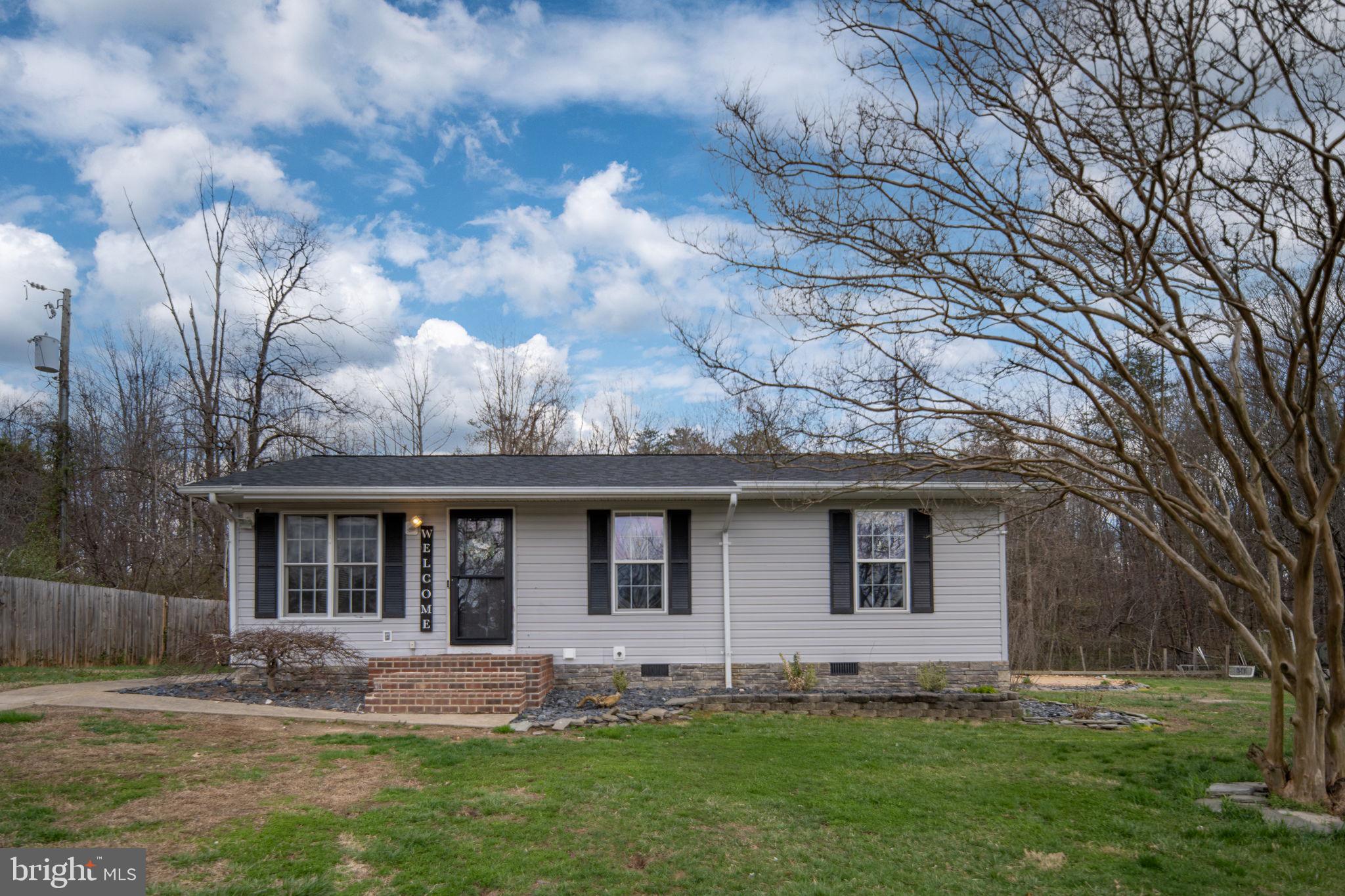 371 Greenbank Road Fredericksburg, VA 22406 - Photo 8 of 54 a front view of house with yard
