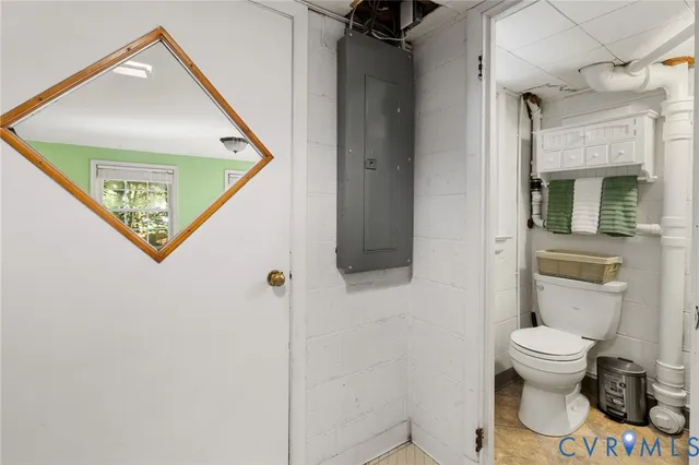 a bathroom with a toilet and a sink