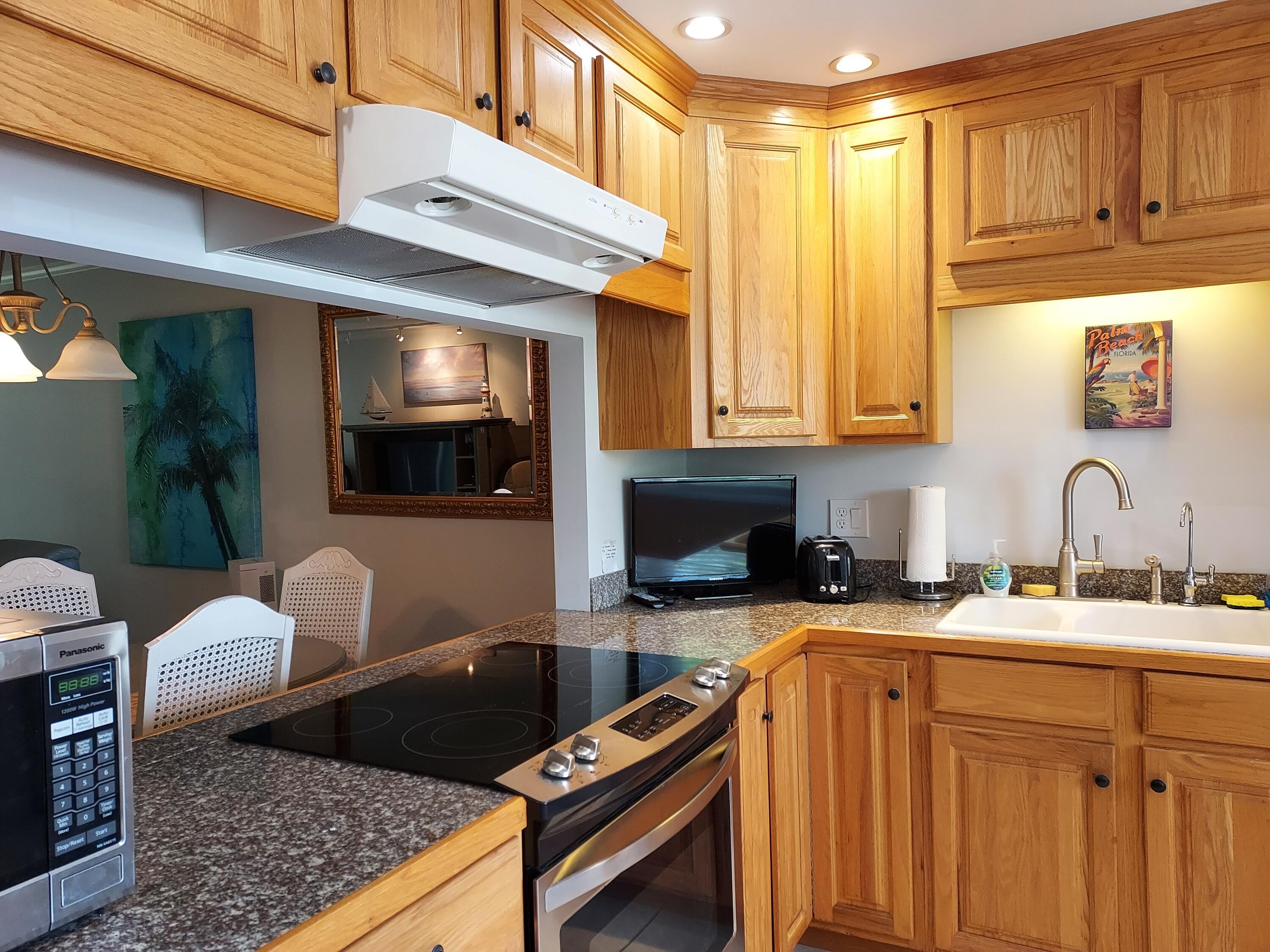 717 Highway 1, Unit 101 Jupiter, FL 33477 - Photo 4 of 27 Open Kitchen