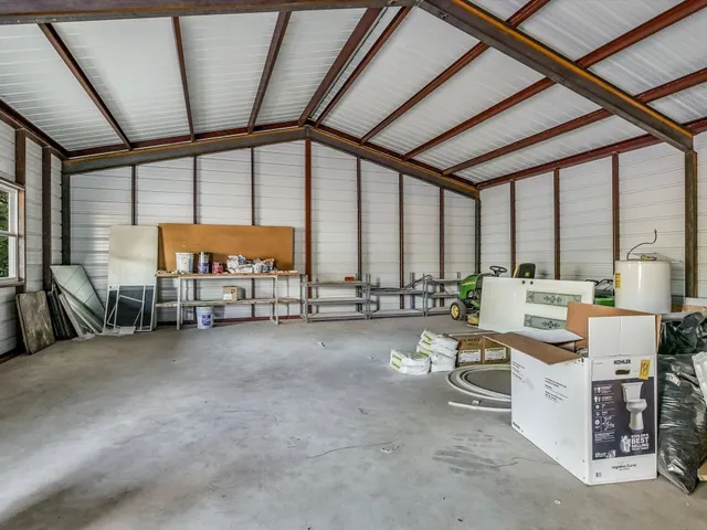 a room with lots of table and chairs