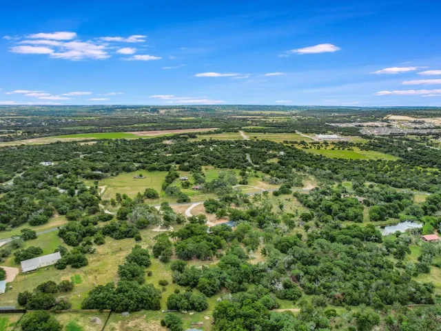 a view of an ocean and a yard
