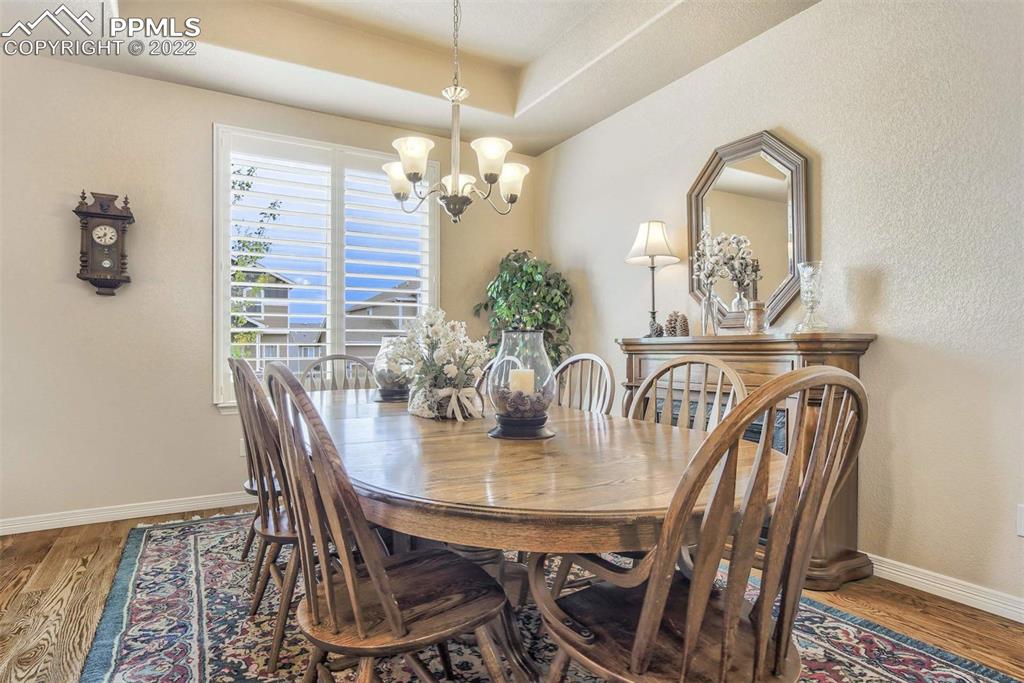12410 Salmon Point Colorado Springs, CO 80921 - Photo 19 of 49 a view of a dining room with furniture
