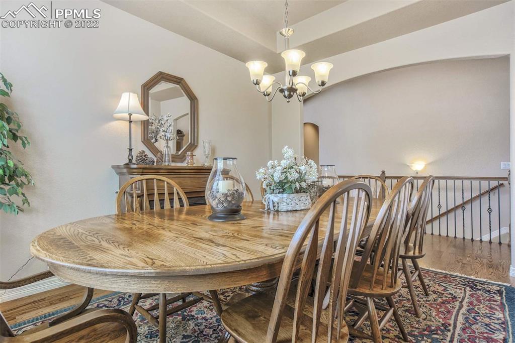 12410 Salmon Point Colorado Springs, CO 80921 - Photo 20 of 49 a view of a dining room with furniture