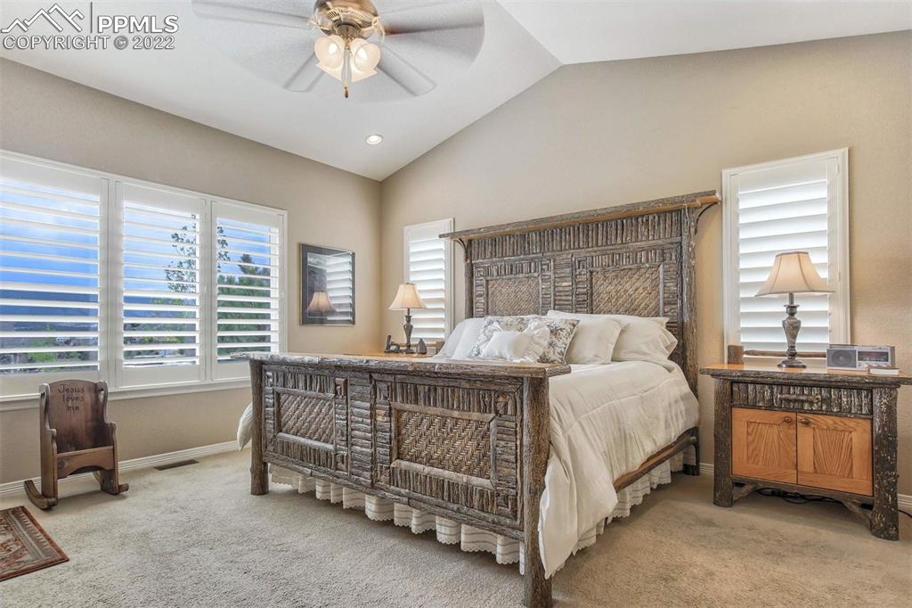 12410 Salmon Point Colorado Springs, CO 80921 - Photo 23 of 49 a bed room with a bed and a window
