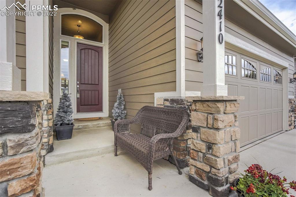 12410 Salmon Point Colorado Springs, CO 80921 - Photo 48 of 49 a view of a entryway door of the house