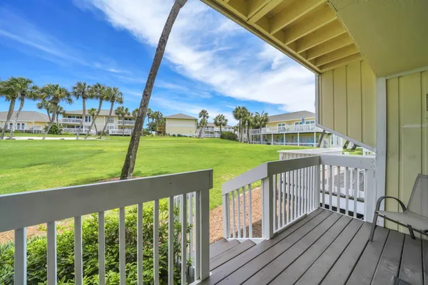 a view of a porch with a yard