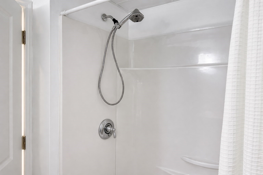 9 Rickard Street Carver, MA 02330 - Photo 11 of 26 a bathroom with a shower
