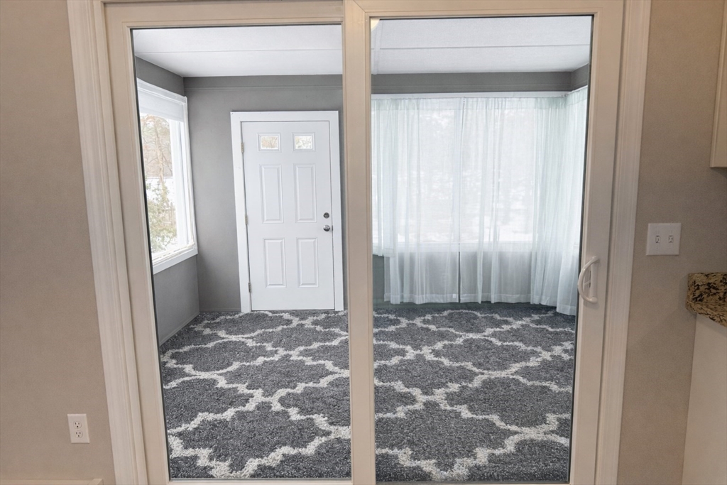 9 Rickard Street Carver, MA 02330 - Photo 6 of 26 a view of a bathroom with windows